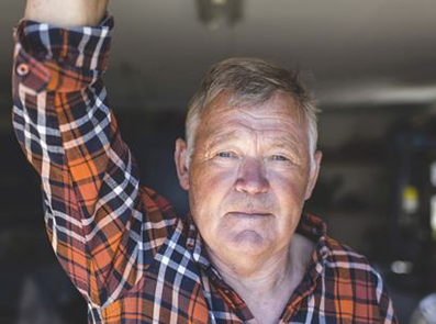 older man looking at camera